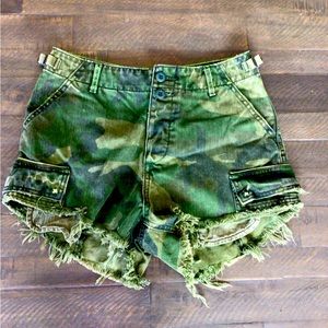 Free People Cargo Cut-offs in vibrant camp green.